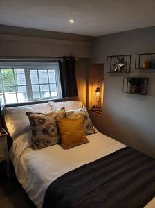 Ένα ή περισσότερα κρεβάτια σε δωμάτιο στο The Horse Inn Hurst
