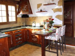 Ett kök eller pentry på Villa Cantos Colorados