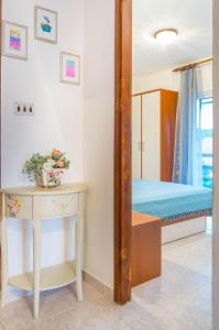 Postel nebo postele na pokoji v ubytování Silver Beach Apartments Vis