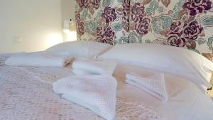 A bed or beds in a room at Villa Patmos Netia