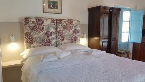 A bed or beds in a room at Villa Patmos Netia