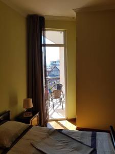 Cozy Guest House in Old Batumi客房内的一张或多张床位