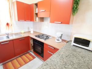 A kitchen or kitchenette at Holiday Home Is Molas by Interhome