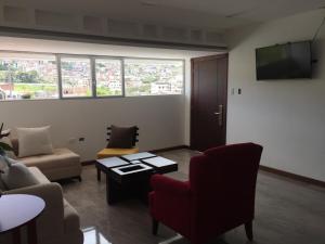 Μια τηλεόραση ή/και κέντρο ψυχαγωγίας στο Apartamento Rinconcito de Luz