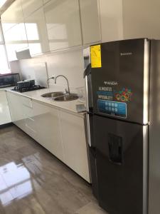 Η κουζίνα ή μικρή κουζίνα στο Apartamento Rinconcito de Luz