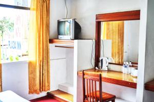 Kuchyň nebo kuchyňský kout v ubytování Plaza Inn