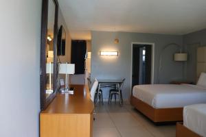 Ένα ή περισσότερα κρεβάτια σε δωμάτιο στο Ocean Mile Hotel +15 φωτογραφίες