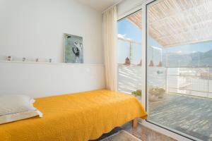 Posteľ alebo postele v izbe v ubytovaní Seafront Penthouse LEO