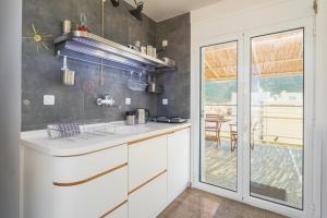 Φωτογραφία από το άλμπουμ του Seafront Penthouse LEO στην Καλαμάτα +37 φωτογραφίες