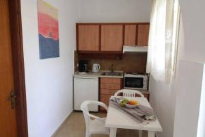 Kuchyň nebo kuchyňský kout v ubytování House Dimitri Agios Georgios Pagoi Corfu