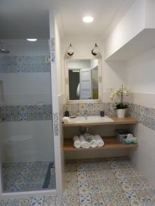 Un baño de Kossuth Apartmanok