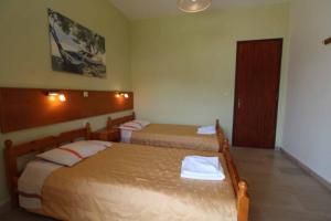 Postel nebo postele na pokoji v ubytování House Dimitri Agios Georgios Pagoi Corfu