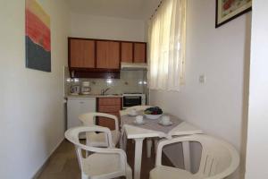 Kuchyň nebo kuchyňský kout v ubytování House Dimitri Agios Georgios Pagoi Corfu