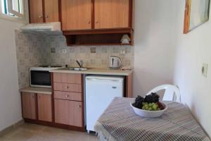 Kuchyň nebo kuchyňský kout v ubytování House Dimitri Agios Georgios Pagoi Corfu