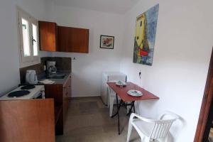 Kuchyň nebo kuchyňský kout v ubytování House Dimitri Agios Georgios Pagoi Corfu