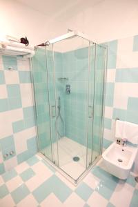 a bathroom with a shower and a toilet at Casa Sorrentina in Sorrento