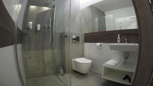 Kúpeľňa v ubytovaní Hotel Sjesta