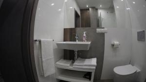Kúpeľňa v ubytovaní Hotel Sjesta