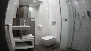 Kúpeľňa v ubytovaní Hotel Sjesta