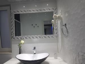Kúpeľňa v ubytovaní Palladium City Center Apartments