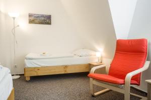 Postel nebo postele na pokoji v ubytování Hotel Konopiště Nová Myslivna