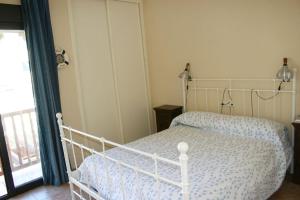 Voodi või voodid majutusasutuse Golf, Sol y Playa en Islantilla (Huelva) toas