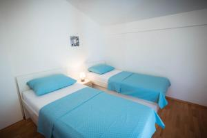 Postel nebo postele na pokoji v ubytování Lego