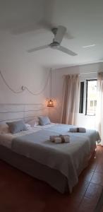 Hostal Sa Posada Set Cales客房内的一张或多张床位