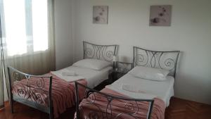 Postel nebo postele na pokoji v ubytování Apartman Teklić