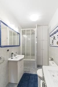 Et badeværelse på Apartament Litoral Jurata