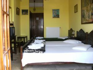 Postel nebo postele na pokoji v ubytování Katerina Hotel