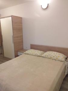 Postel nebo postele na pokoji v ubytování Apartments Villa Antony