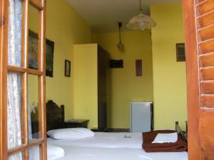 Postel nebo postele na pokoji v ubytování Katerina Hotel