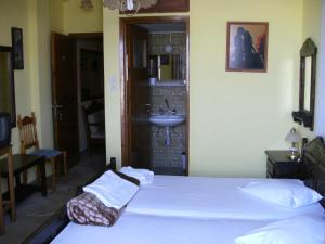 Postel nebo postele na pokoji v ubytování Katerina Hotel