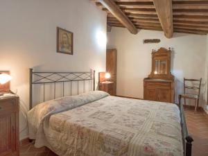 A bed or beds in a room at Apartment Papavero by Interhome