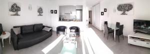 Posedenie v ubytovaní Precioso Apartamento Frente Al Mar