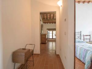 A bed or beds in a room at Apartment Papavero by Interhome