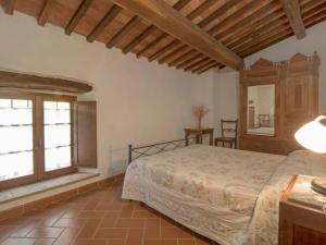 A bed or beds in a room at Apartment Papavero by Interhome