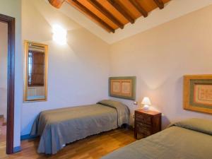Postel nebo postele na pokoji v ubytování Apartment Il Borghetto-1 by Interhome