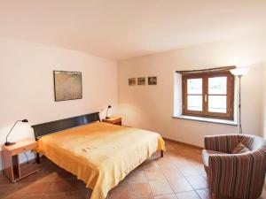 Posteľ alebo postele v izbe v ubytovaní Apartment I Noccioli by Interhome