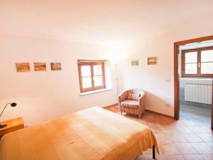 Posteľ alebo postele v izbe v ubytovaní Apartment I Noccioli by Interhome