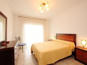 Katil atau katil-katil dalam bilik di Apartment Delicias B by Interhome