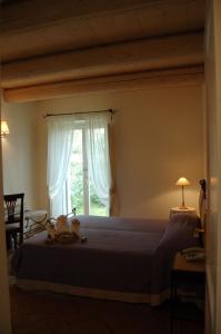 Postel nebo postele na pokoji v ubytování Valcastagno Relais & Residence