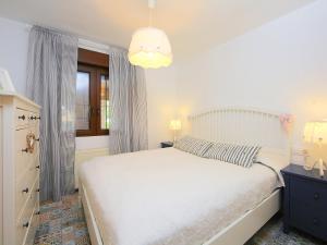 Postel nebo postele na pokoji v ubytování Holiday Home Verano by Interhome
