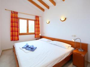 Posteľ alebo postele v izbe v ubytovaní Holiday Home Monte y Mar by Interhome