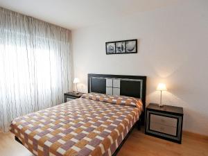 A bed or beds in a room at Apartment Duplex Iberia