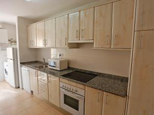 A kitchen or kitchenette at Apartment Duplex Iberia