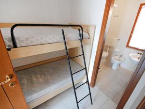Posteľ alebo postele v izbe v ubytovaní Apartment Lecci-1 by Interhome