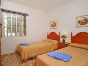 Ένα ή περισσότερα κρεβάτια σε δωμάτιο στο Holiday Home Patrai by Interhome
