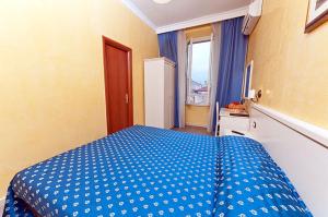 Posteľ alebo postele v izbe v ubytovaní Cesar Palace Guesthouse